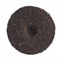 Dharma Cloud sheng puerh cake, back