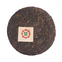 Gatekeeper sheng puerh cake, front