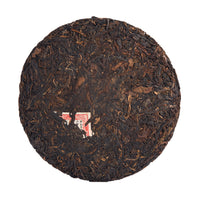 Righteousness sheng puerh cake, front