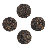 The teas of the Yiwu Set, dry leaves