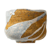 Winter Dawn chawan, a pale blue-grey glaze running down over bare ochre clay.