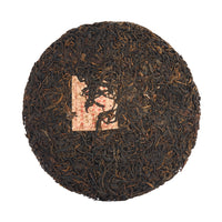 Fragrant Mountain sheng puerh cake, front
