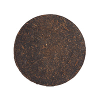 Iron Staff sheng puerh cake, front