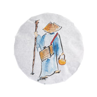Iron Staff sheng puerh cake in its paper wrapper