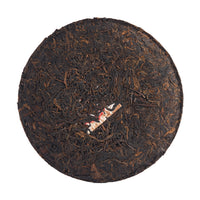Red Mark sheng puerh cake, front