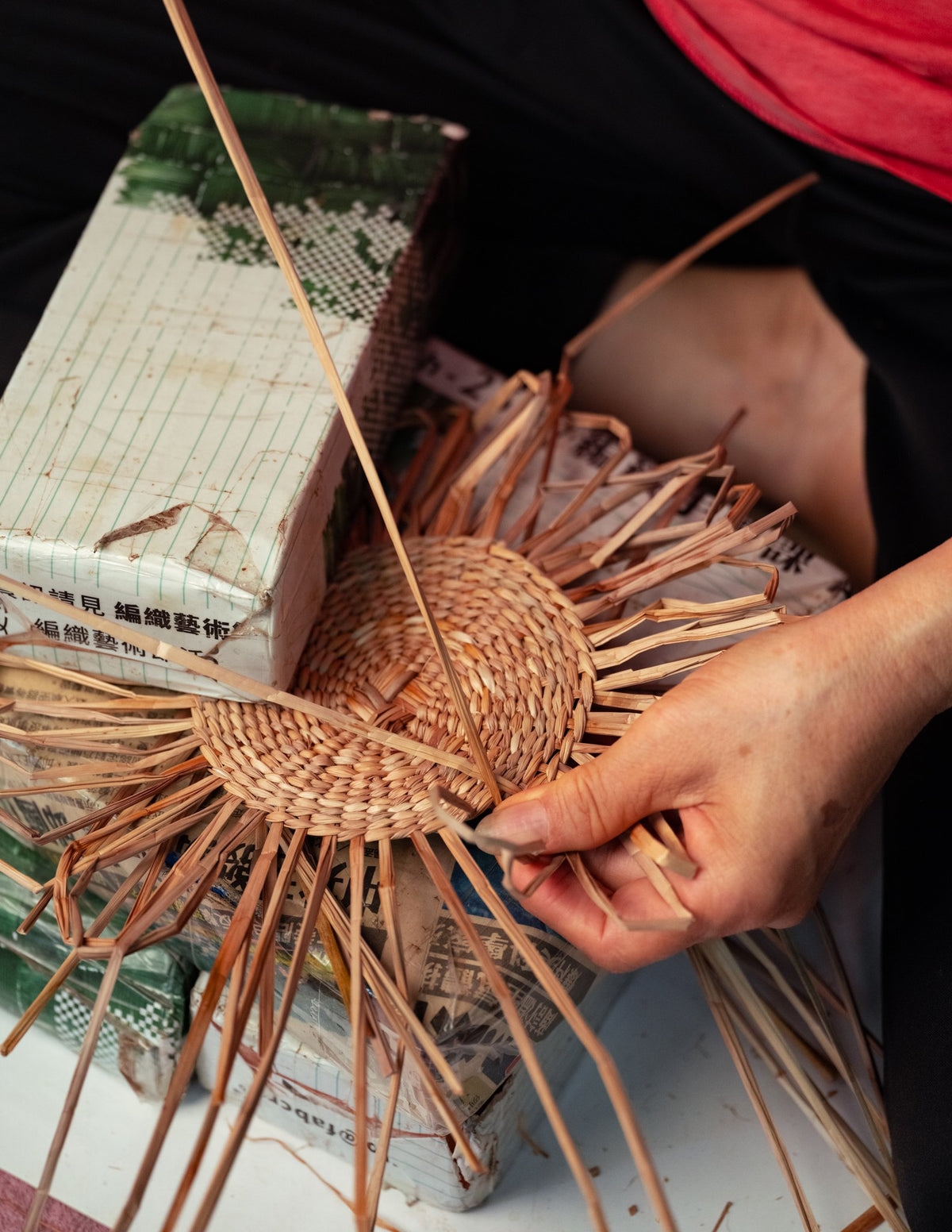 Weaving a rush trivet by hand