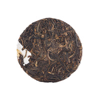 White Elephant sheng puerh cake, front