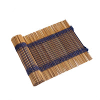 Indigo, a handwoven bamboo and cotton chabu, laid out